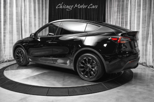 Used 2022 Tesla Model Y Long Range AWD SUV Solid Black! Autopilot! Induction Wheels! ONLY 50 Miles! for sale Sold at Chicago Motor Cars in West Chicago IL 60185 3
