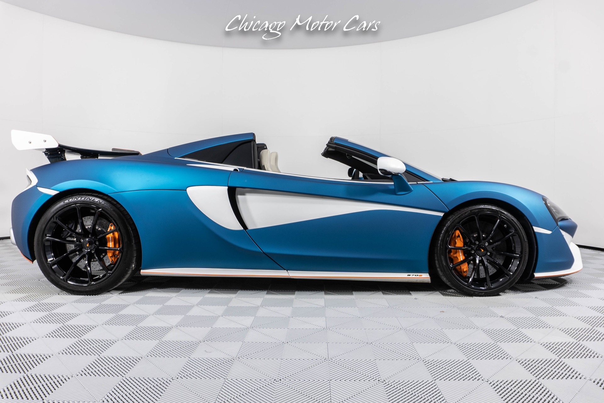 Used-2018-McLaren-570S-Spider-Luxury-Package-Carbon-Fiber-Wing-Matte-Aquamarine-Wrap-Loaded