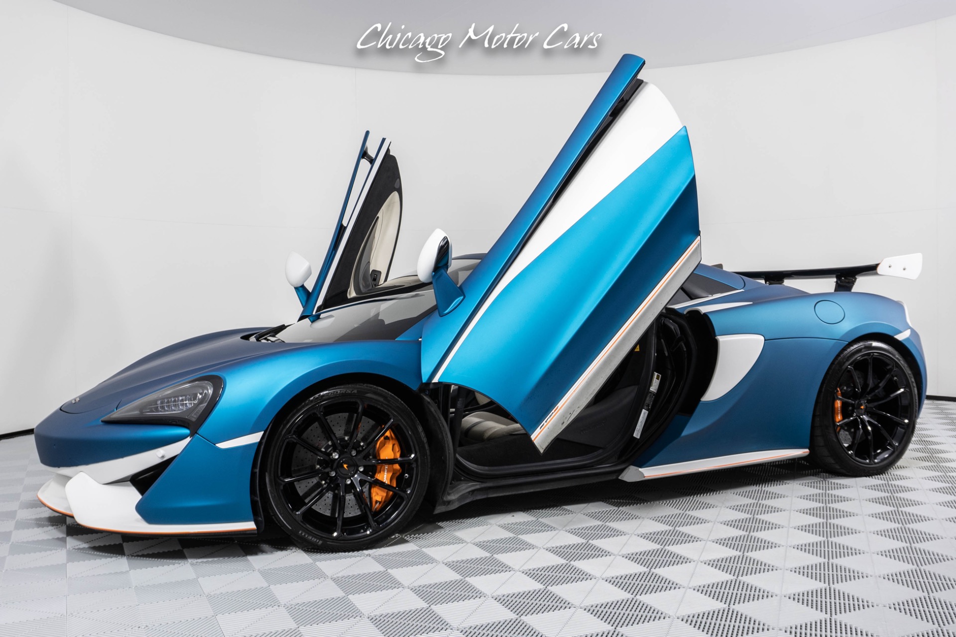 Used-2018-McLaren-570S-Spider-Luxury-Package-Carbon-Fiber-Wing-Matte-Aquamarine-Wrap-Loaded