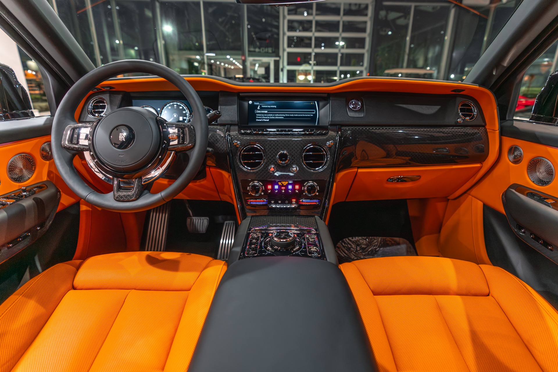 Used-2023-Rolls-Royce-Cullinan-Black-Badge-Original-MSRP-491750-Mandarin-Orange-Interior-Carbon-FIBER