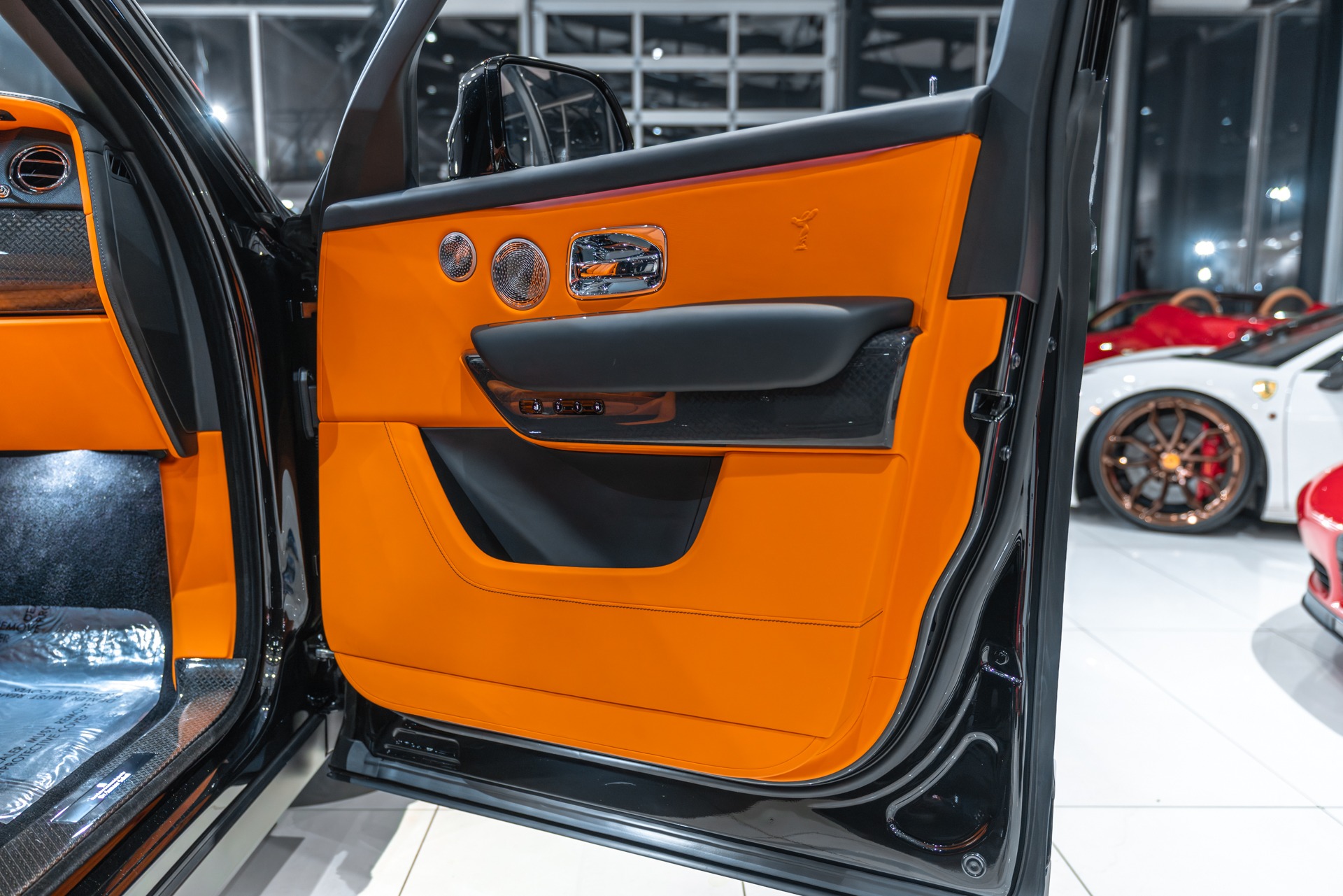 Used-2023-Rolls-Royce-Cullinan-Black-Badge-Original-MSRP-491750-Mandarin-Orange-Interior-Carbon-FIBER