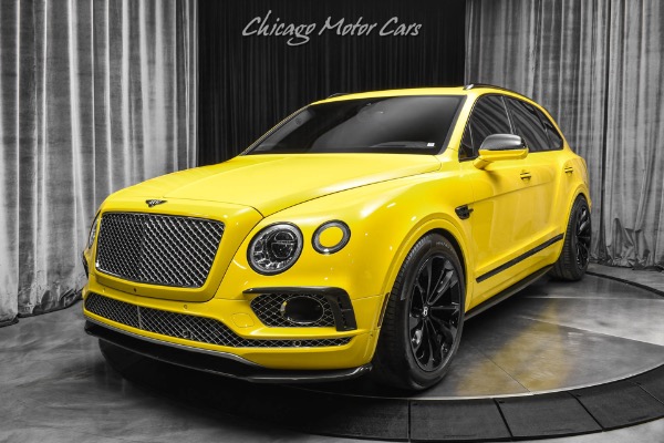 Used 2017 Bentley Bentayga W12 Monaco Yellow Mulliner Driving Spec Pano Roof Carbon Exterior Upgrades for sale Sold at Chicago Motor Cars in West Chicago IL 60185 2
