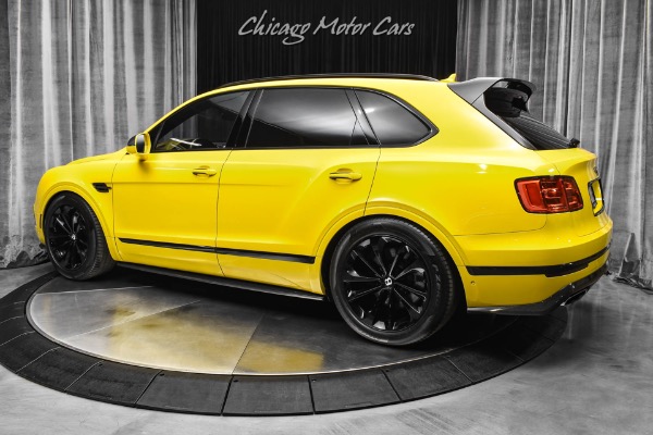 Used 2017 Bentley Bentayga W12 Monaco Yellow Mulliner Driving Spec Pano Roof Carbon Exterior Upgrades for sale Sold at Chicago Motor Cars in West Chicago IL 60185 3