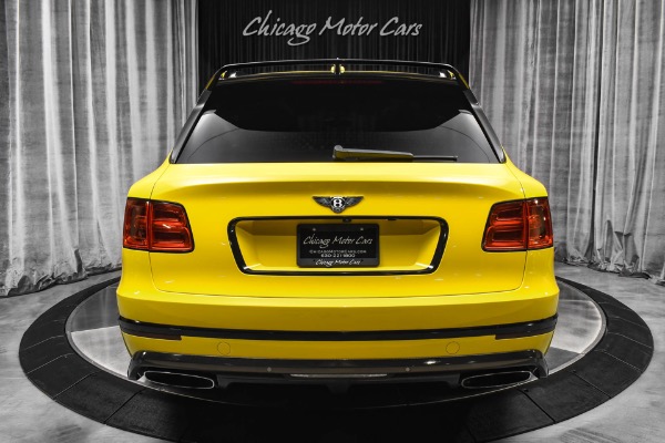 Used 2017 Bentley Bentayga W12 Monaco Yellow Mulliner Driving Spec Pano Roof Carbon Exterior Upgrades for sale Sold at Chicago Motor Cars in West Chicago IL 60185 4