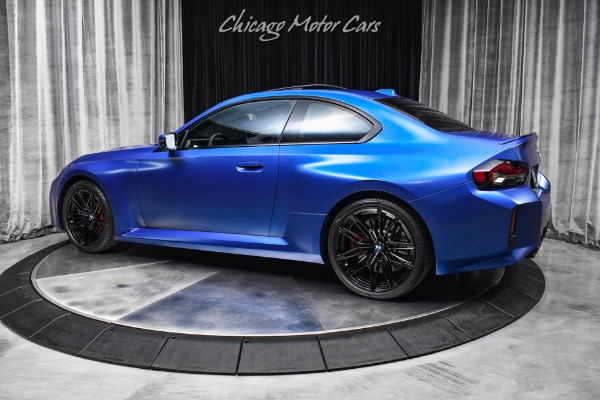 Used 2025 BMW M2 1k Miles 6 Manual Frozen Portimao Blue II Carbon Fiber Trim WARRANTY LOADED for sale Sold at Chicago Motor Cars in West Chicago IL 60185 3