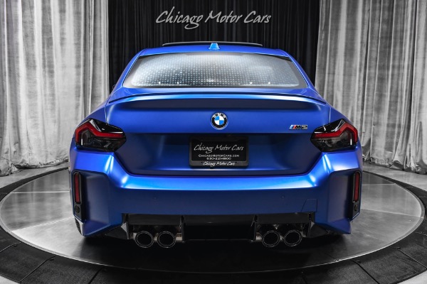 Used 2025 BMW M2 1k Miles 6 Manual Frozen Portimao Blue II Carbon Fiber Trim WARRANTY LOADED for sale Sold at Chicago Motor Cars in West Chicago IL 60185 4