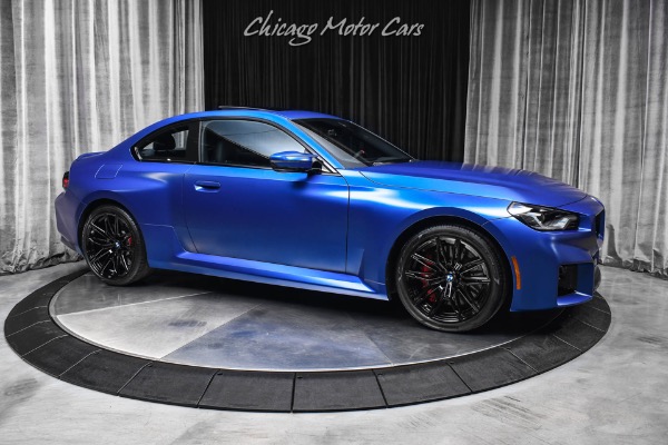 Used 2025 BMW M2 1k Miles 6 Manual Frozen Portimao Blue II Carbon Fiber Trim WARRANTY LOADED for sale Sold at Chicago Motor Cars in West Chicago IL 60185 6