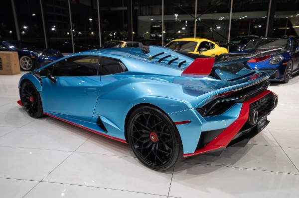 Used 2023 Lamborghini Huracan STO Rare Blu Aegir Factory Akrapovic Full Exterior and Interior Carbon for sale Sold at Chicago Motor Cars in West Chicago IL 60185 2