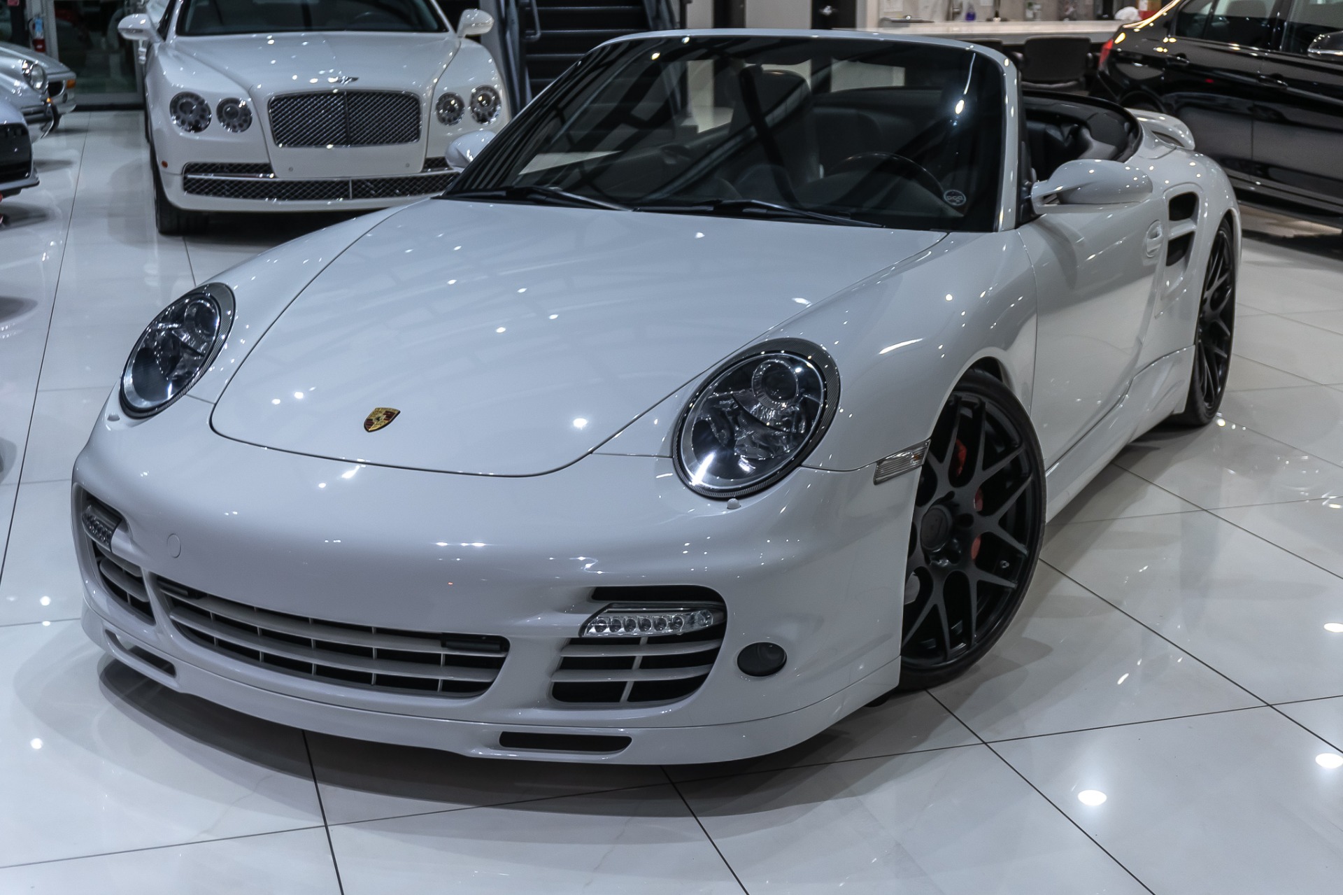 White Porsche 911 Turbo Convertible with MSRP $155K+