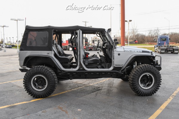 Used-2013-Jeep-Wrangler-Unlimited-Rubicon-4X4-Metallic-Clear-Coat-Exterior-over-Black-Leather-Interior-A-TRUE-ROCK-CRAWLE