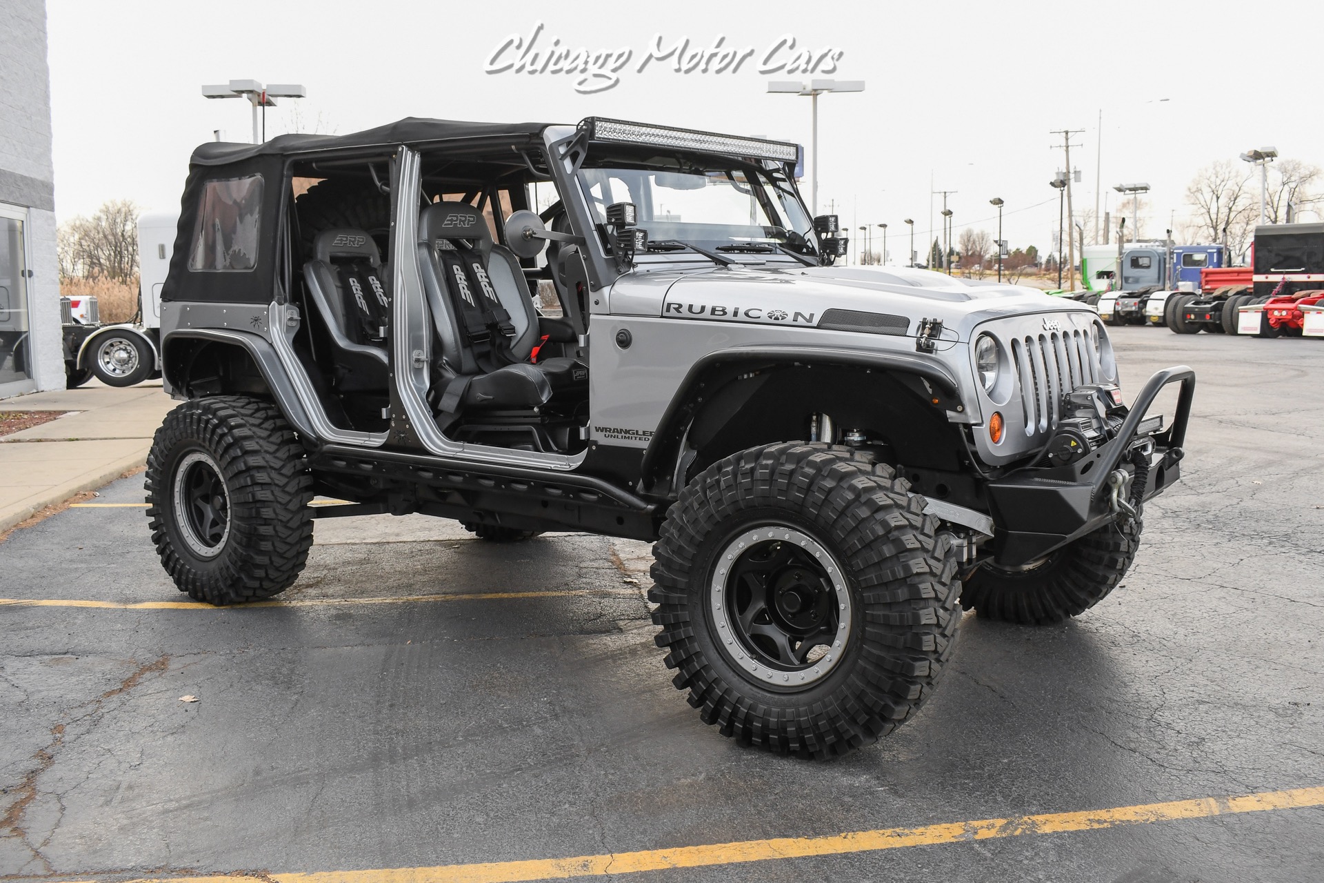 Used-2013-Jeep-Wrangler-Unlimited-Rubicon-4X4-Metallic-Clear-Coat-Exterior-over-Black-Leather-Interior-A-TRUE-ROCK-CRAWLE