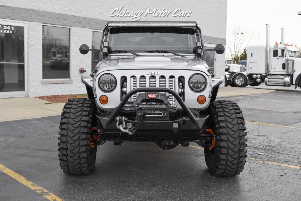 Used-2013-Jeep-Wrangler-Unlimited-Rubicon-4X4-Metallic-Clear-Coat-Exterior-over-Black-Leather-Interior-A-TRUE-ROCK-CRAWLE