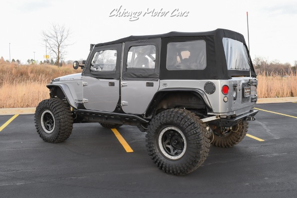 Used 2013 Jeep Wrangler Unlimited Rubicon 4X4 Metallic Clear Coat Exterior over Black Leather Interior A TRUE ROCK CRAWLE for sale Sold at Chicago Motor Cars in West Chicago IL 60185 2