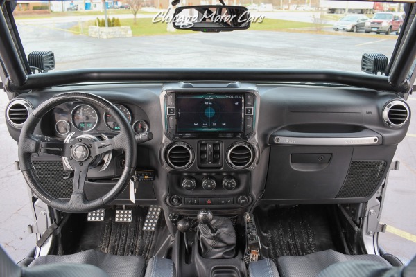 Used-2013-Jeep-Wrangler-Unlimited-Rubicon-4X4-Metallic-Clear-Coat-Exterior-over-Black-Leather-Interior-A-TRUE-ROCK-CRAWLE