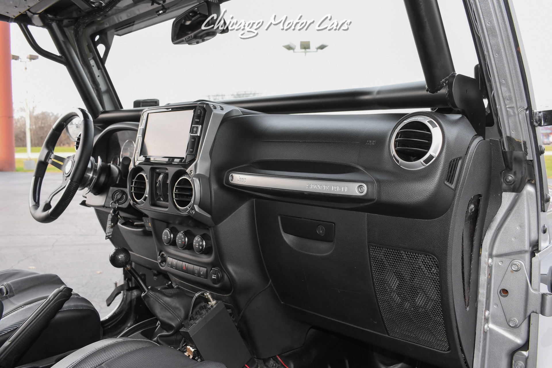 Used-2013-Jeep-Wrangler-Unlimited-Rubicon-4X4-Metallic-Clear-Coat-Exterior-over-Black-Leather-Interior-A-TRUE-ROCK-CRAWLE