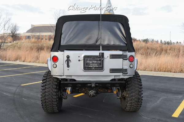 Used 2013 Jeep Wrangler Unlimited Rubicon 4X4 Metallic Clear Coat Exterior over Black Leather Interior A TRUE ROCK CRAWLE for sale Sold at Chicago Motor Cars in West Chicago IL 60185 3