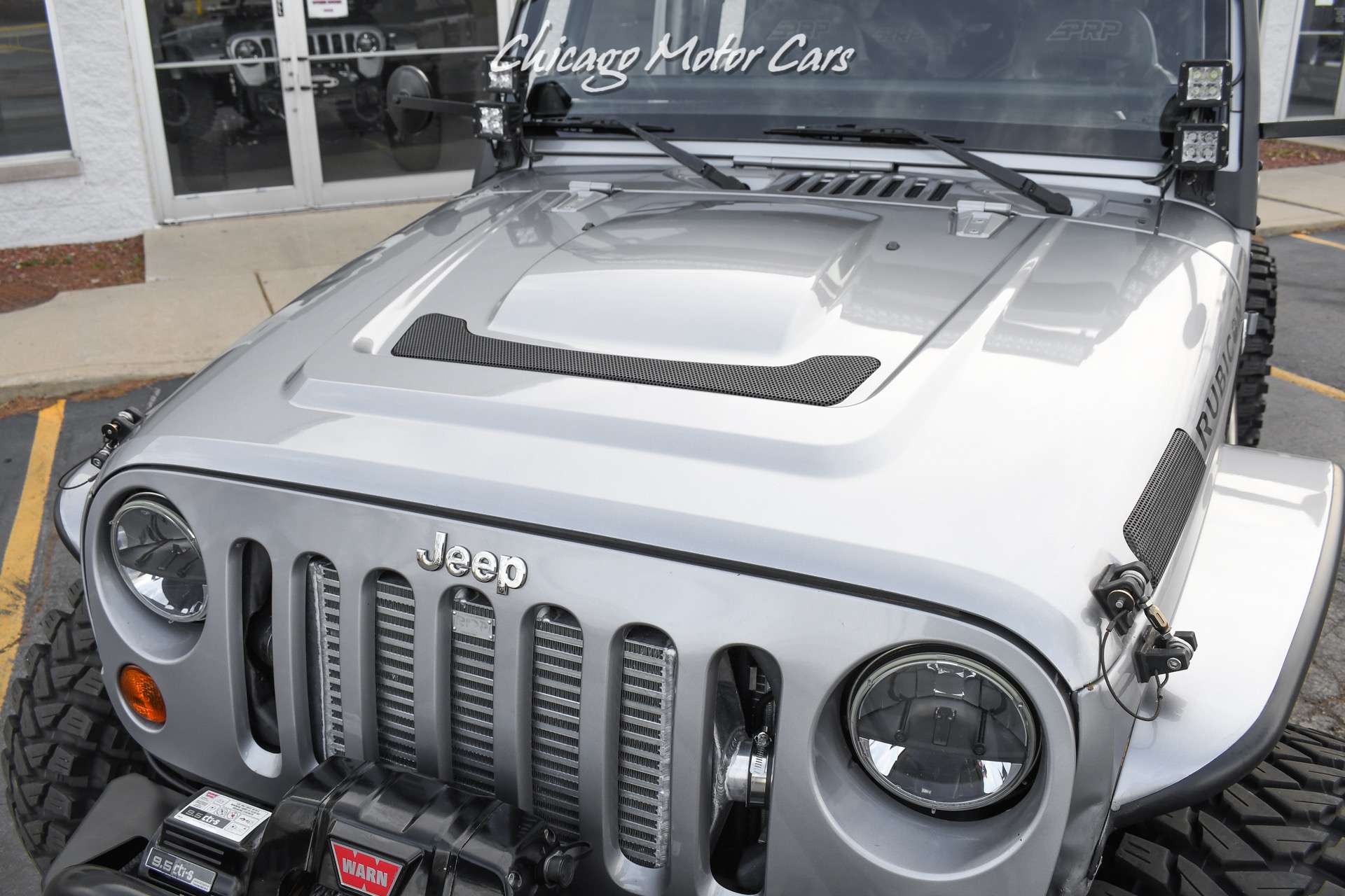 Used-2013-Jeep-Wrangler-Unlimited-Rubicon-4X4-Metallic-Clear-Coat-Exterior-over-Black-Leather-Interior-A-TRUE-ROCK-CRAWLE