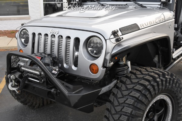 Used-2013-Jeep-Wrangler-Unlimited-Rubicon-4X4-Metallic-Clear-Coat-Exterior-over-Black-Leather-Interior-A-TRUE-ROCK-CRAWLE