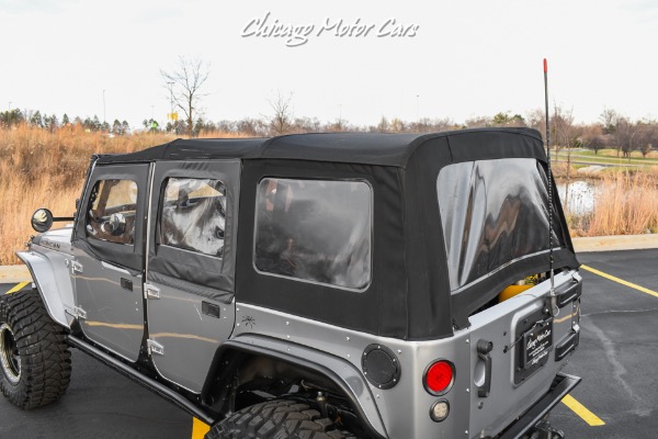 Used-2013-Jeep-Wrangler-Unlimited-Rubicon-4X4-Metallic-Clear-Coat-Exterior-over-Black-Leather-Interior-A-TRUE-ROCK-CRAWLE