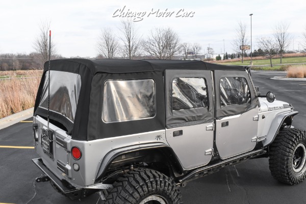 Used-2013-Jeep-Wrangler-Unlimited-Rubicon-4X4-Metallic-Clear-Coat-Exterior-over-Black-Leather-Interior-A-TRUE-ROCK-CRAWLE