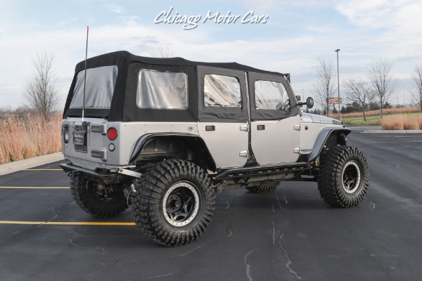 Used 2013 Jeep Wrangler Unlimited Rubicon 4X4 Metallic Clear Coat Exterior over Black Leather Interior A TRUE ROCK CRAWLE for sale Sold at Chicago Motor Cars in West Chicago IL 60185 4