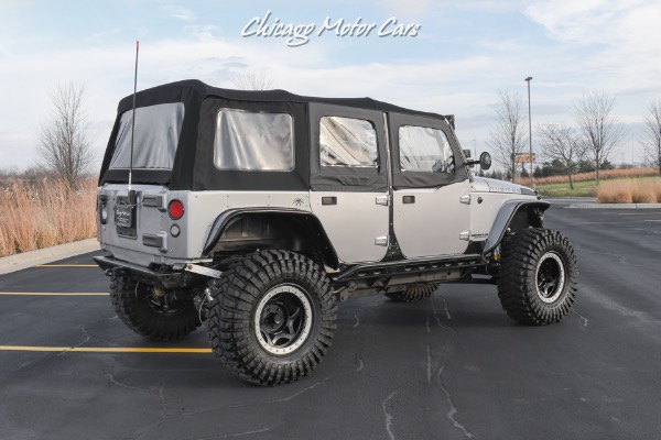 Used-2013-Jeep-Wrangler-Unlimited-Rubicon-4X4-Metallic-Clear-Coat-Exterior-over-Black-Leather-Interior-A-TRUE-ROCK-CRAWLE