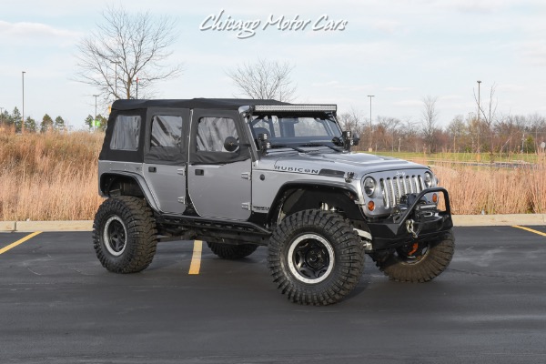 Used 2013 Jeep Wrangler Unlimited Rubicon 4X4 Metallic Clear Coat Exterior over Black Leather Interior A TRUE ROCK CRAWLE for sale Sold at Chicago Motor Cars in West Chicago IL 60185 5