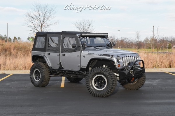 Used-2013-Jeep-Wrangler-Unlimited-Rubicon-4X4-Metallic-Clear-Coat-Exterior-over-Black-Leather-Interior-A-TRUE-ROCK-CRAWLE