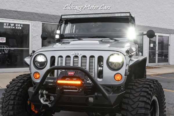 Used-2013-Jeep-Wrangler-Unlimited-Rubicon-4X4-Metallic-Clear-Coat-Exterior-over-Black-Leather-Interior-A-TRUE-ROCK-CRAWLE