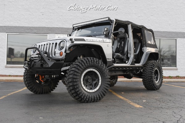 Used 2013 Jeep Wrangler Unlimited Rubicon 4X4 Metallic Clear Coat Exterior over Black Leather Interior A TRUE ROCK CRAWLE for sale Sold at Chicago Motor Cars in West Chicago IL 60185 6