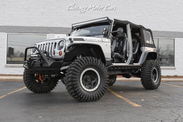 Used-2013-Jeep-Wrangler-Unlimited-Rubicon-4X4-Metallic-Clear-Coat-Exterior-over-Black-Leather-Interior-A-TRUE-ROCK-CRAWLE