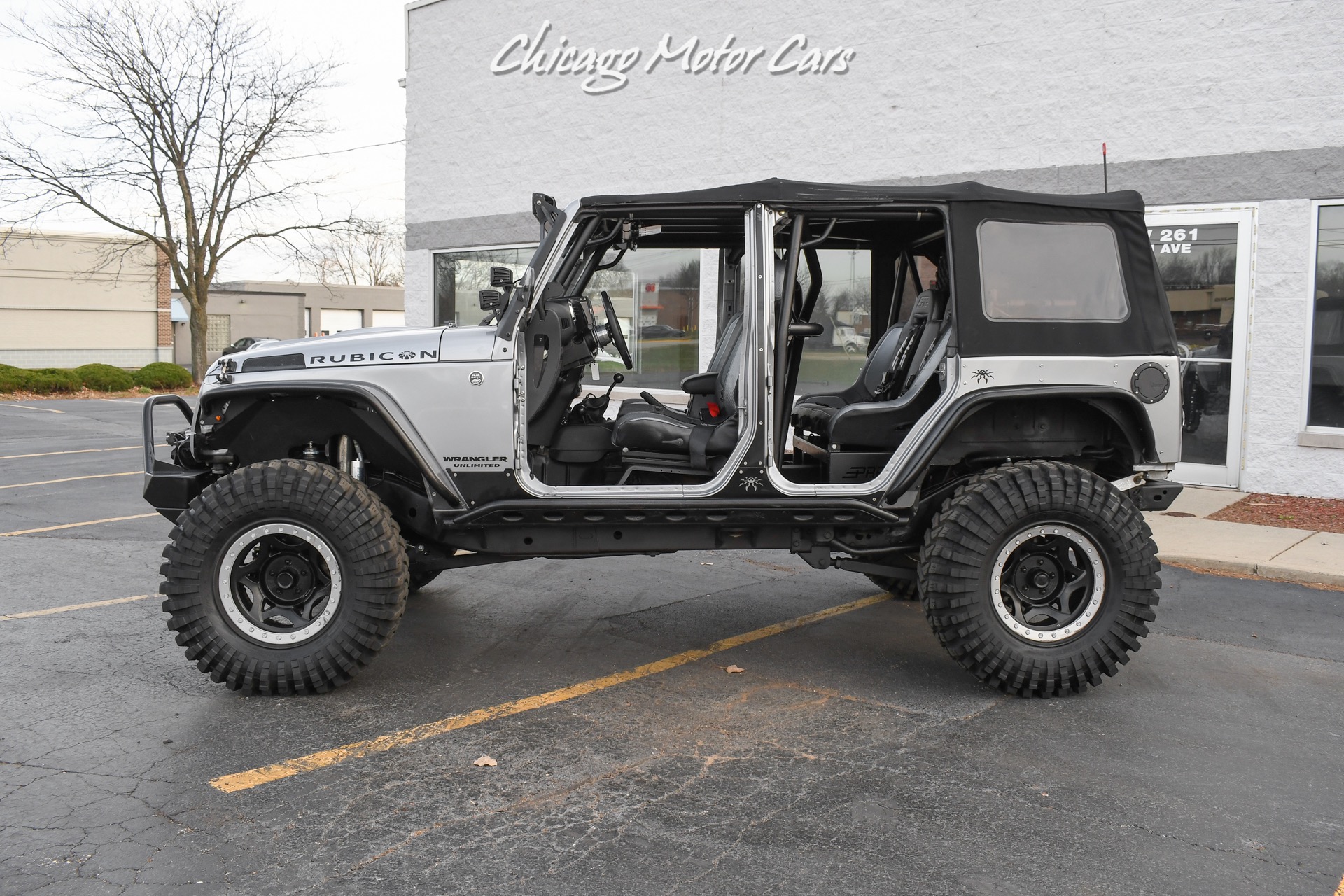 Used-2013-Jeep-Wrangler-Unlimited-Rubicon-4X4-Metallic-Clear-Coat-Exterior-over-Black-Leather-Interior-A-TRUE-ROCK-CRAWLE