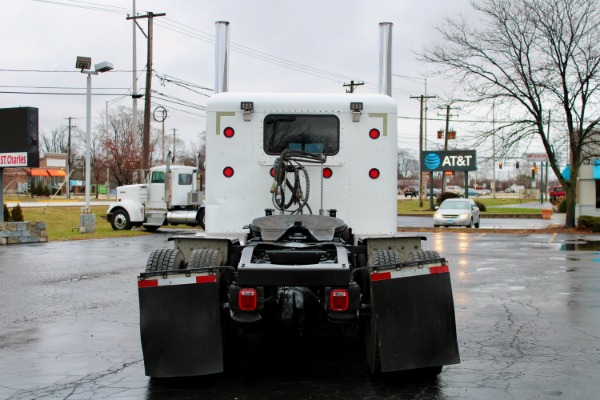 Used-2002-Peterbilt-379-Tri-Axle-with-Lift-CAT-C15-6NZ-550-HP-Double-Wet-Kit