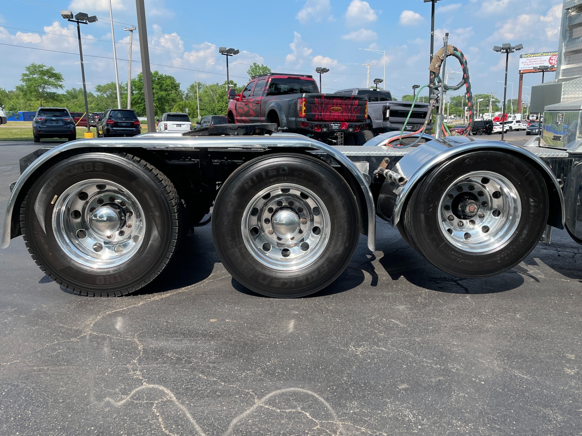 Used-2014-Kenworth-W900-Quad-Axle-Day-Cab---CUMMINS-ISX-550-Horsepower-13-Speed-Manual-Wet-Kit