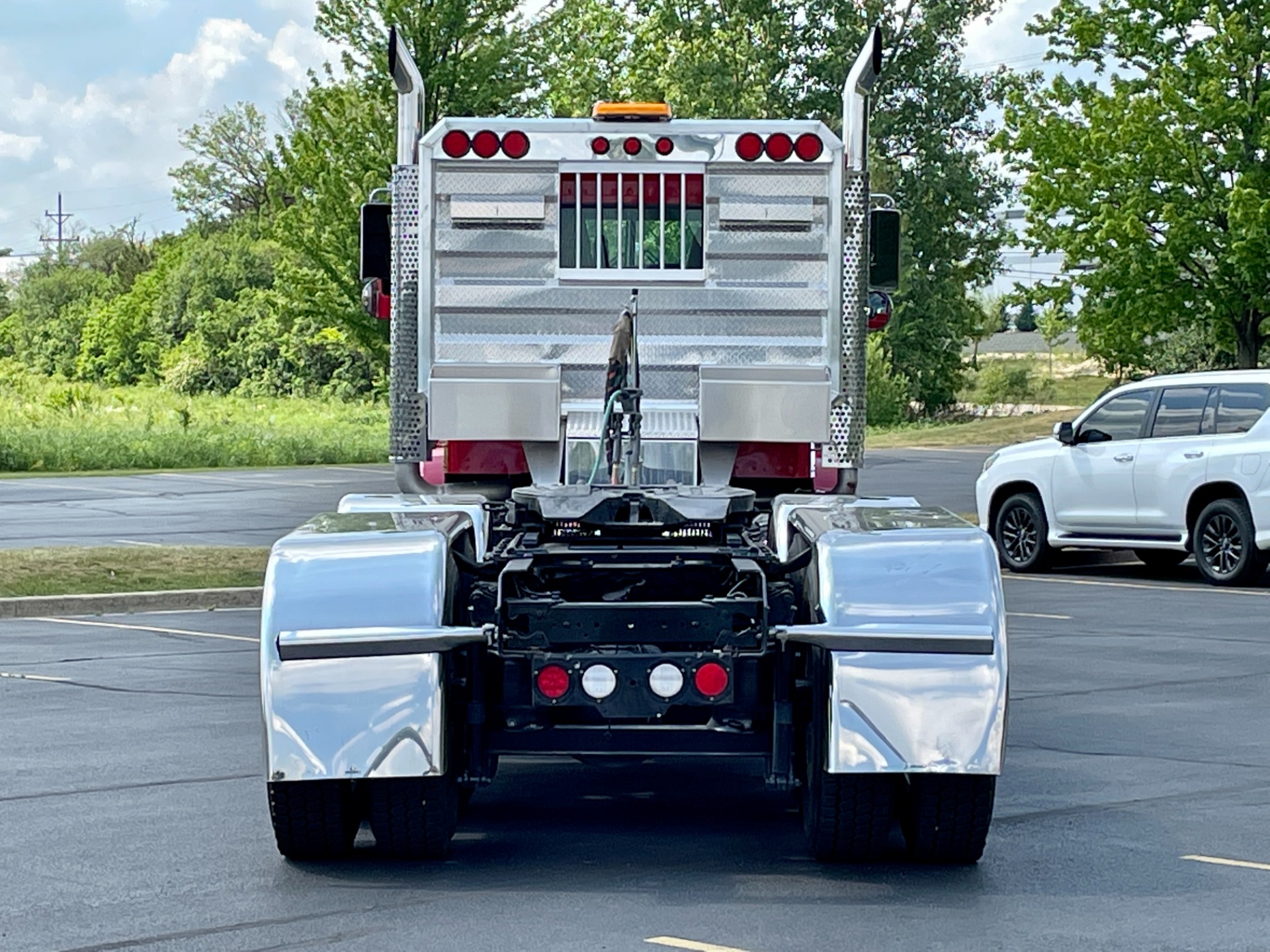 Used-2014-Kenworth-W900-Quad-Axle-Day-Cab---CUMMINS-ISX-550-Horsepower-13-Speed-Manual-Wet-Kit