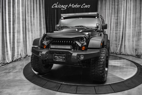 Used 2013 Jeep Wrangler Unlimited Sahara Moab! 4 inch! Lift 35in Tires Hardtop + Bestop Soft top! Leather! for sale Sold at Chicago Motor Cars in West Chicago IL 60185 2