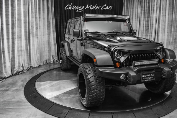 Used-2013-Jeep-Wrangler-Unlimited-Sahara-Moab-4-inch-Lift-35in-Tires-Hardtop--Bestop-Soft-top-Leather