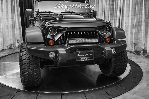 Used-2013-Jeep-Wrangler-Unlimited-Sahara-Moab-4-inch-Lift-35in-Tires-Hardtop--Bestop-Soft-top-Leather