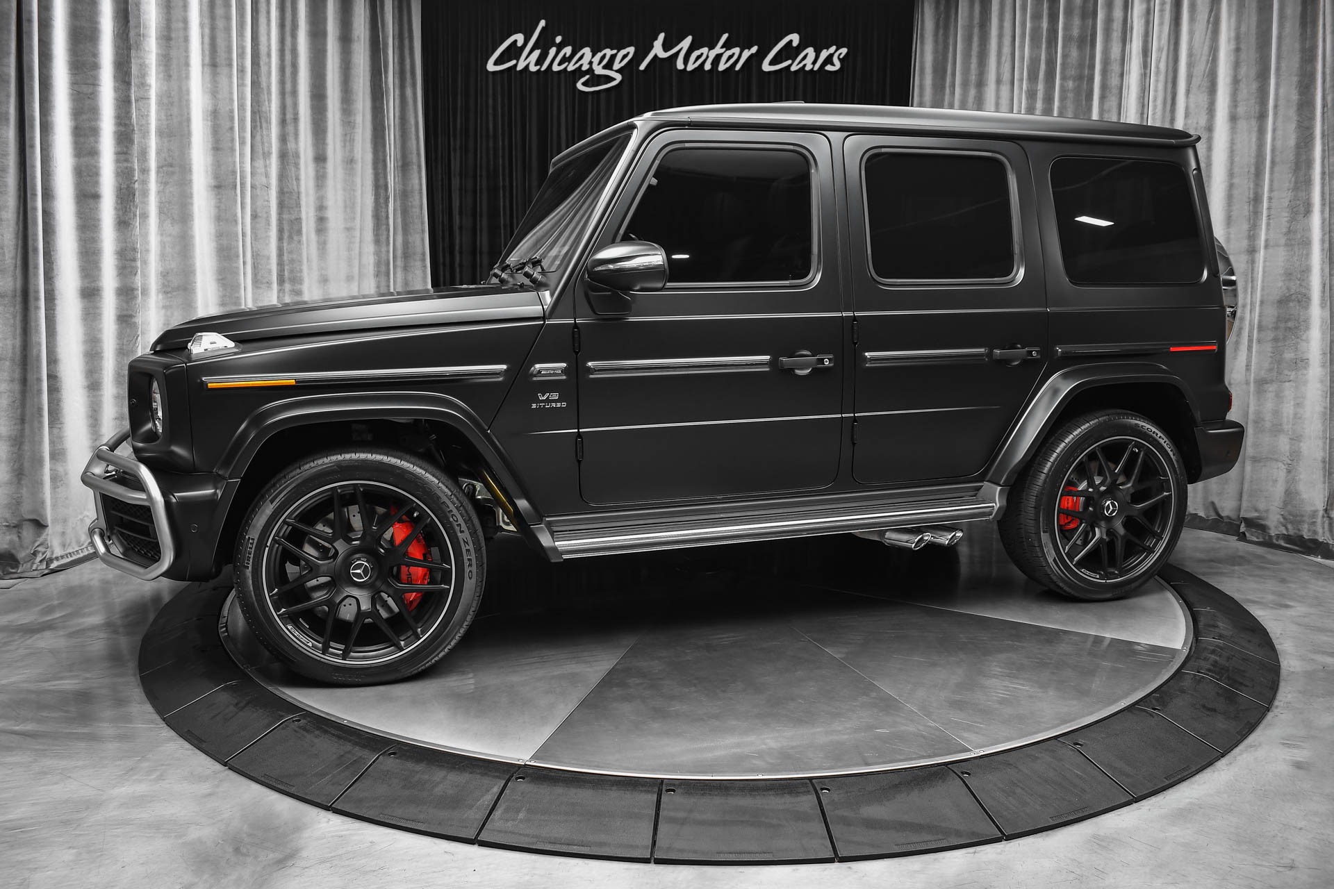 matte black car with red interior