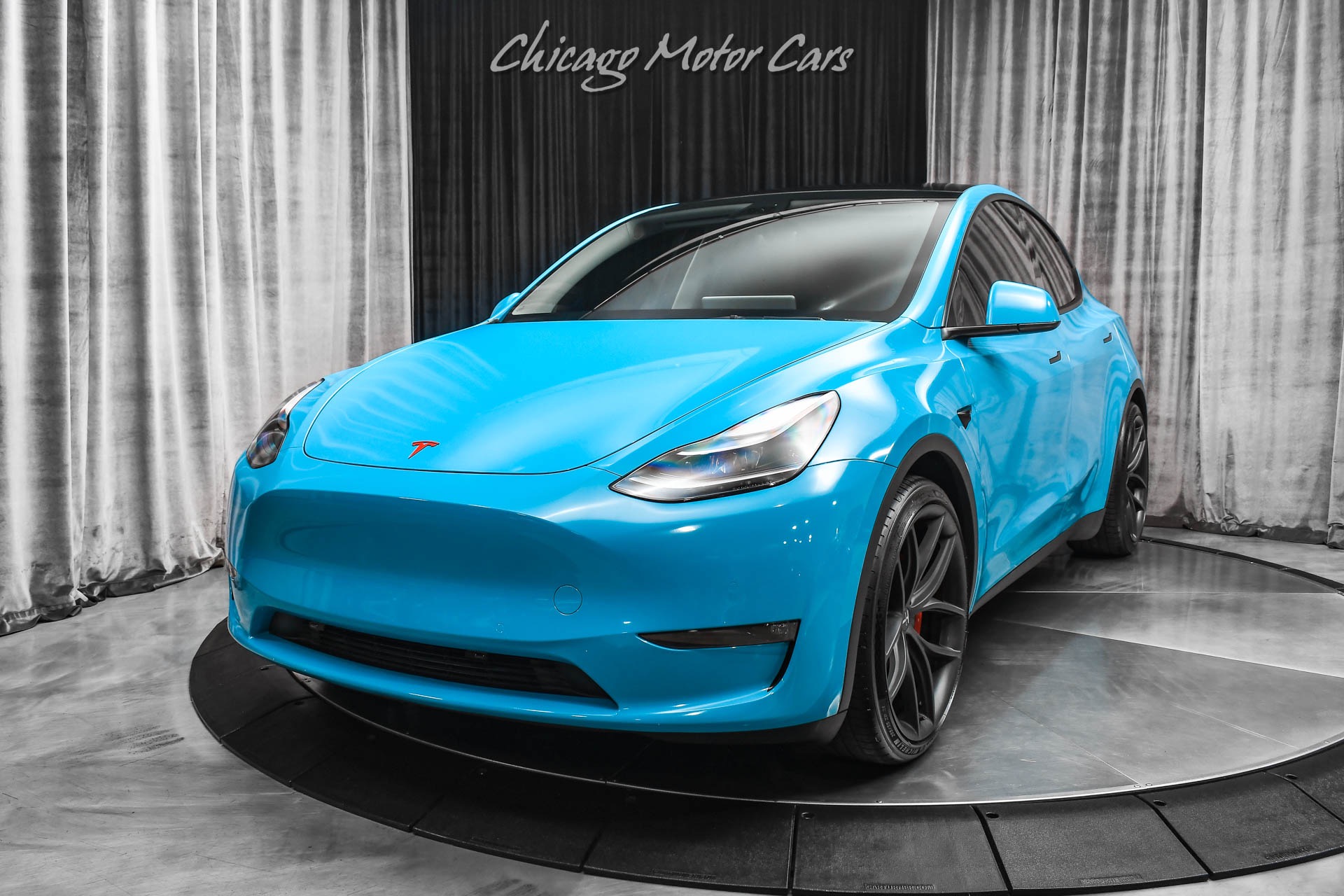 Used-2022-Tesla-Model-Y-Performance-SUV-Autopilot-Miami-Blue-Wrap-T-Sportline-Wheels-Carbon-Trim