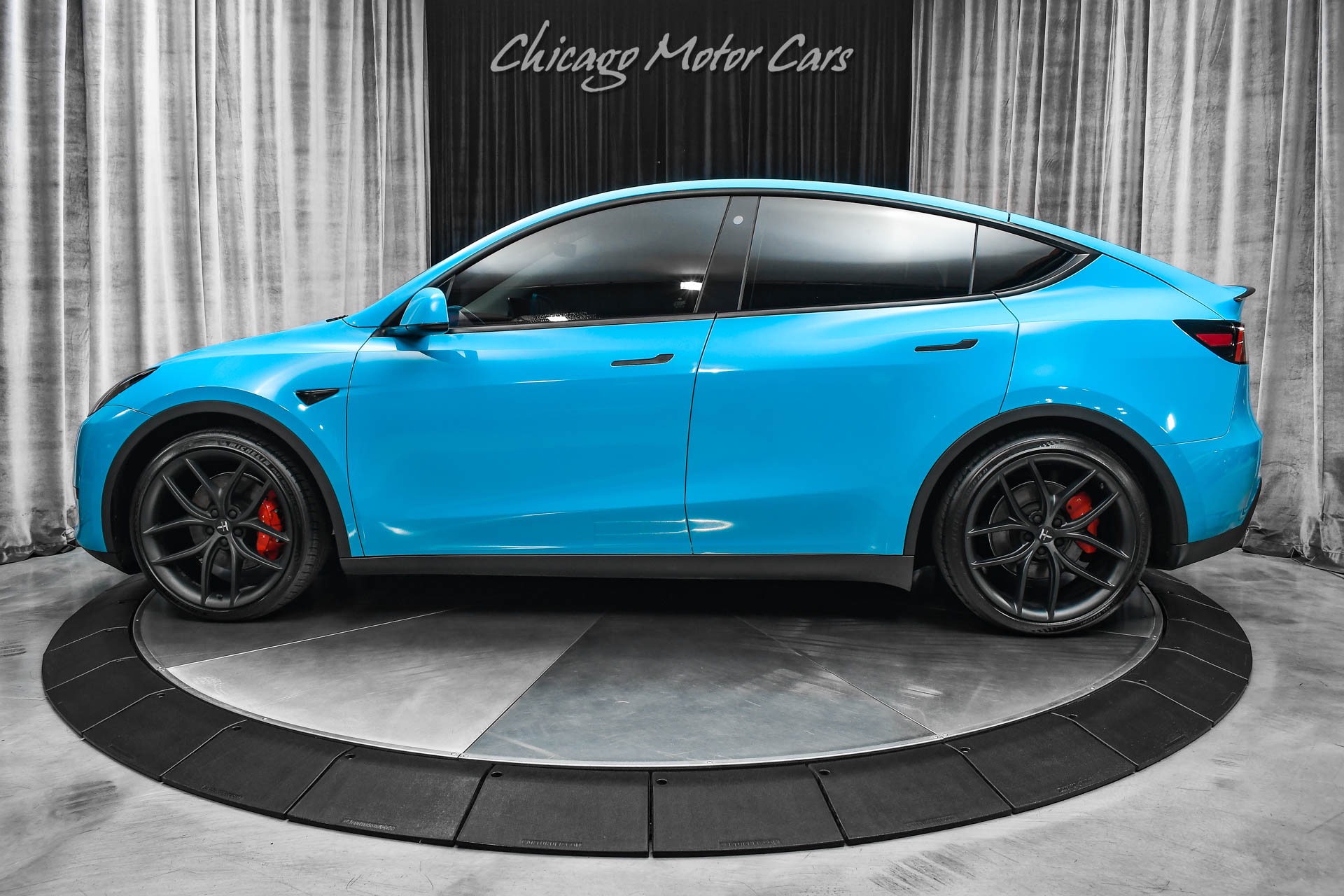 Used-2022-Tesla-Model-Y-Performance-SUV-Autopilot-Miami-Blue-Wrap-T-Sportline-Wheels-Carbon-Trim