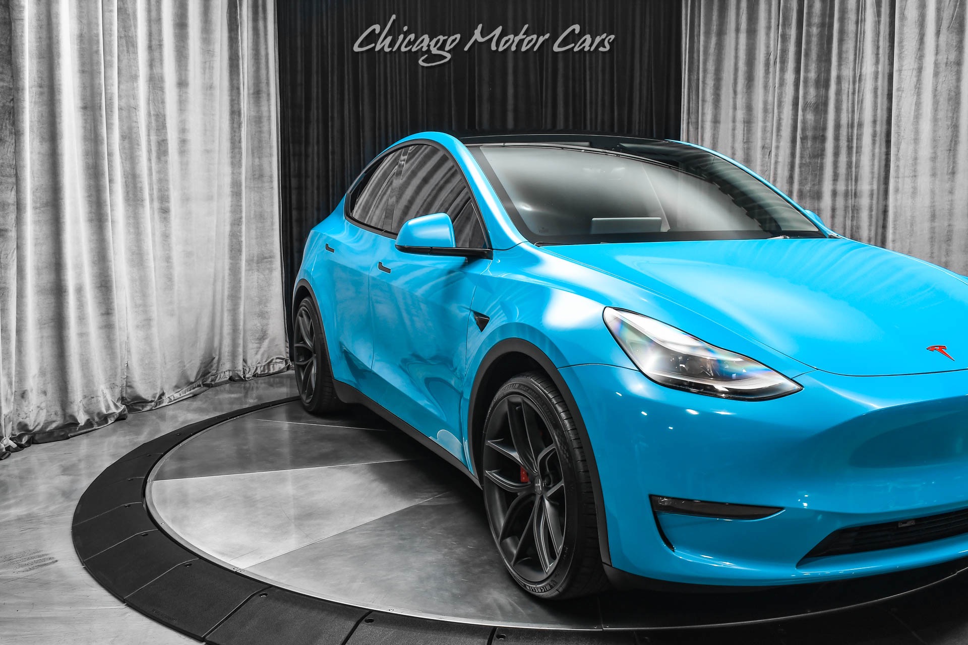 Used-2022-Tesla-Model-Y-Performance-SUV-Autopilot-Miami-Blue-Wrap-T-Sportline-Wheels-Carbon-Trim